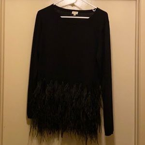 Black Cremieux sweater.